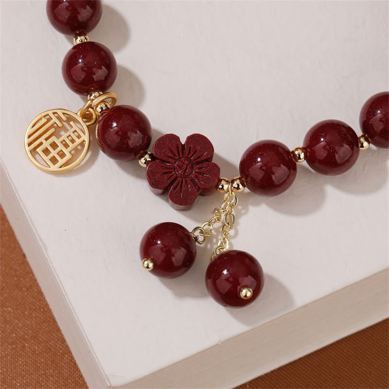 Bracelet de bénédiction en fleurs de cerisier avec personnage Fu et Buddha Stones en cinabre