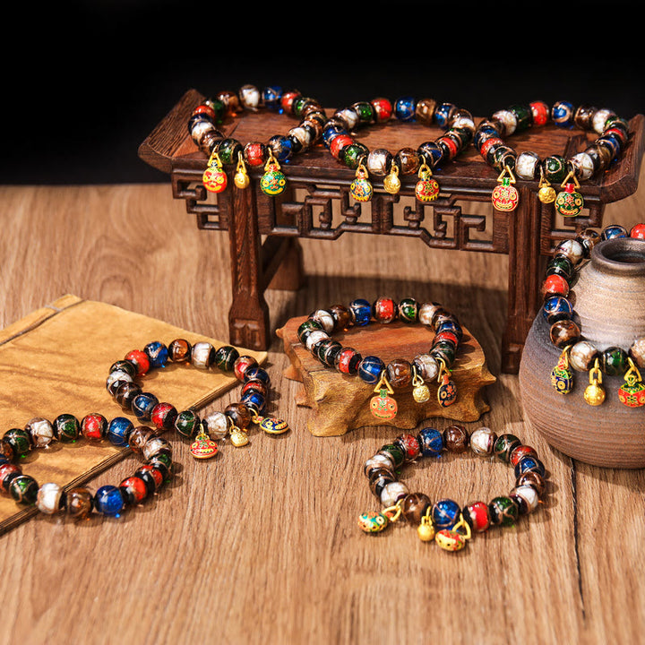 Bracelet porte-bonheur en perles de verre Liuli avec breloque de la famille des bêtes avaleuses en or et Buddha Stones
