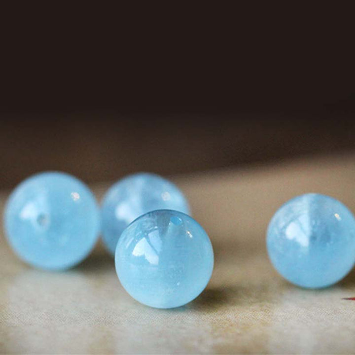 Bracelet de guérison et de sérénité en perles d'ambre et d'aigue-marine naturelles