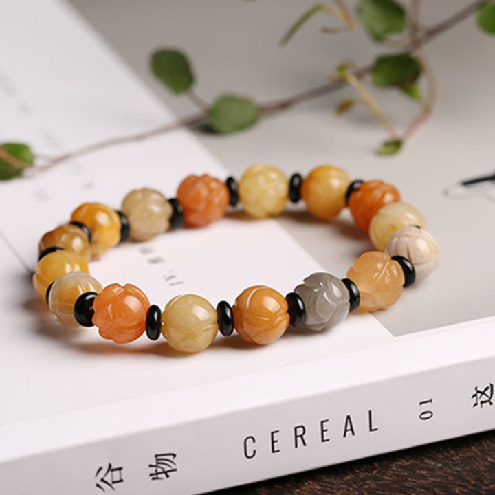 Bracelet de chance en jade et soie dorée avec lotus