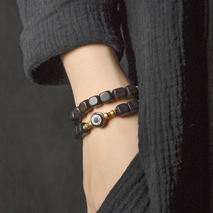 Bracelet couple paix en cuivre avec perles dzi en bois d'ébène