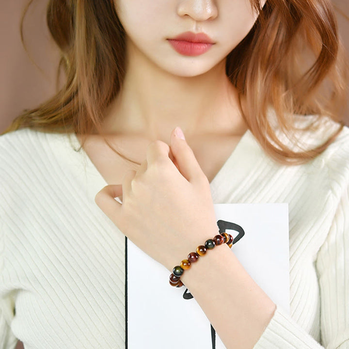 Bracelet de protection positive en œil de tigre naturel Buddha Stones