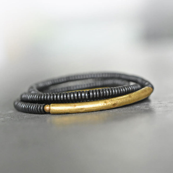 Bracelet multicouches en bois d'ébène et cuivre avec Buddha Stones