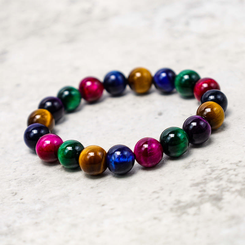 Bracelet courageux et résolu en œil de tigre avec Buddha Stones