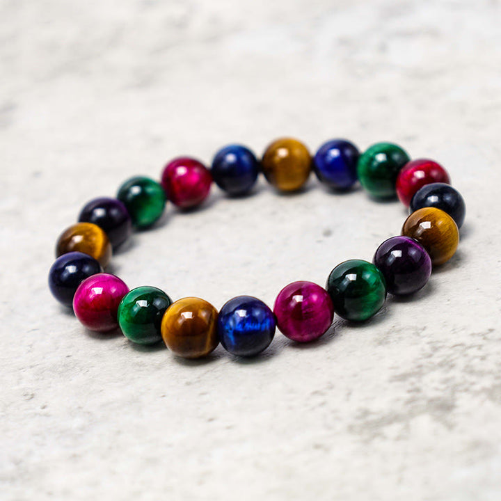 Bracelet courageux et résolu en œil de tigre avec Buddha Stones