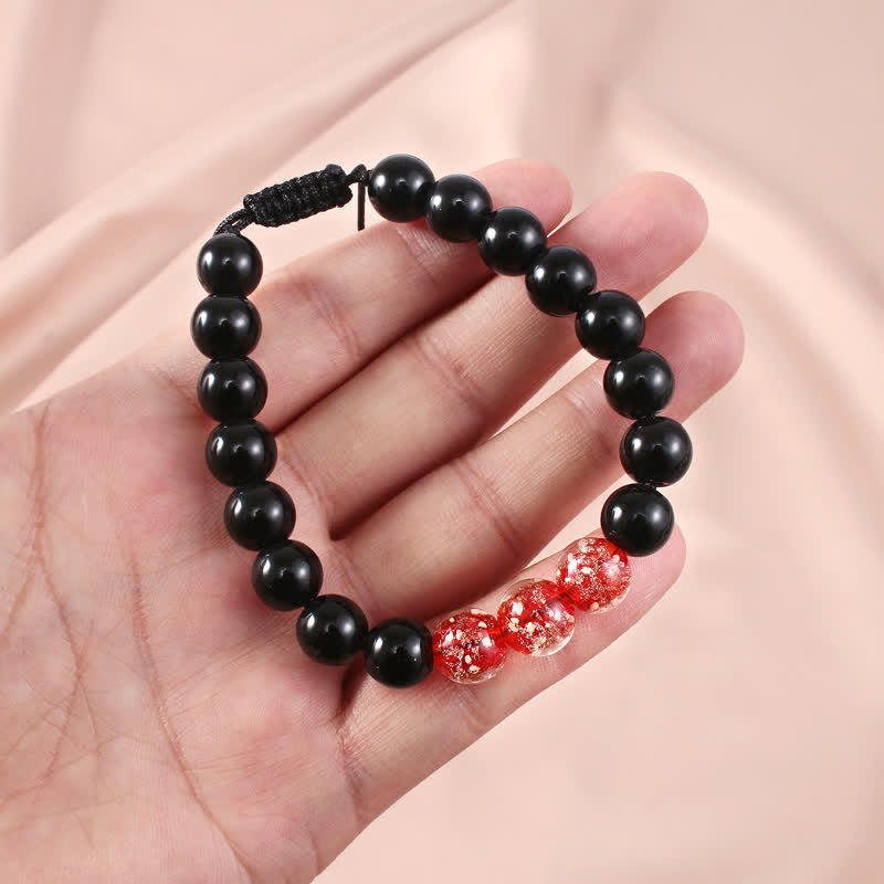 Bracelet de force lumineux en obsidienne noire Buddha Stones