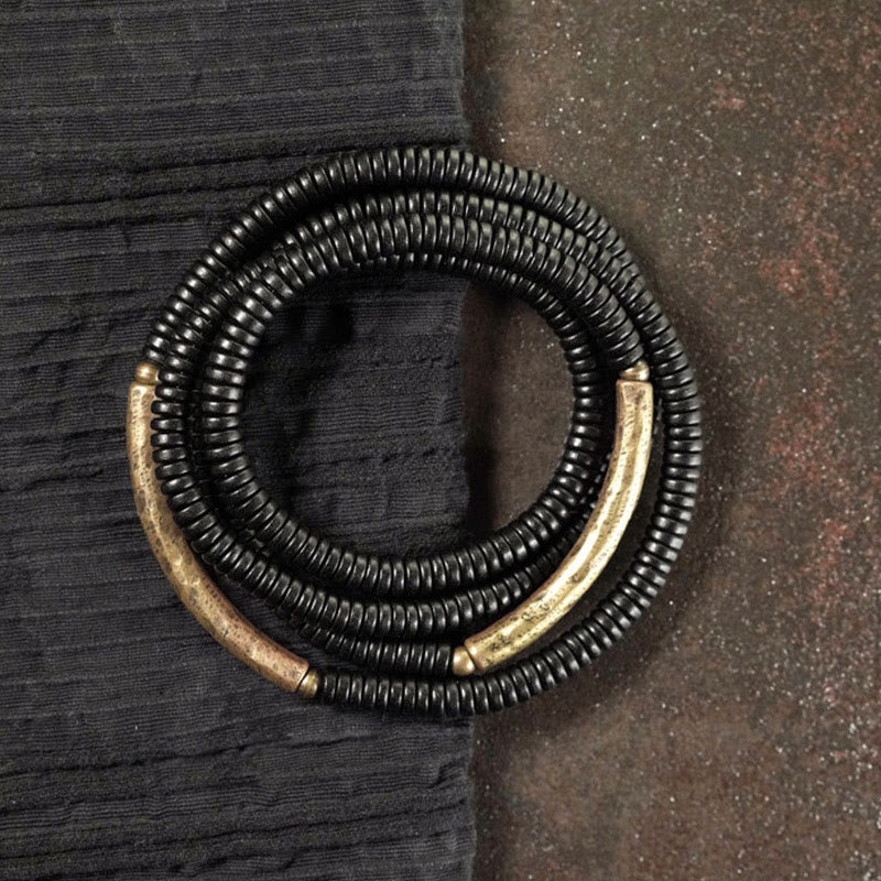 Bracelet multicouches en bois d'ébène et cuivre avec Buddha Stones