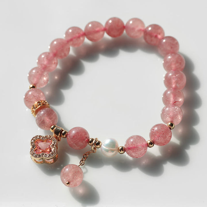 Bracelet de guérison à breloques en trèfle à quatre feuilles avec perles de quartz fraise et Buddha Stones