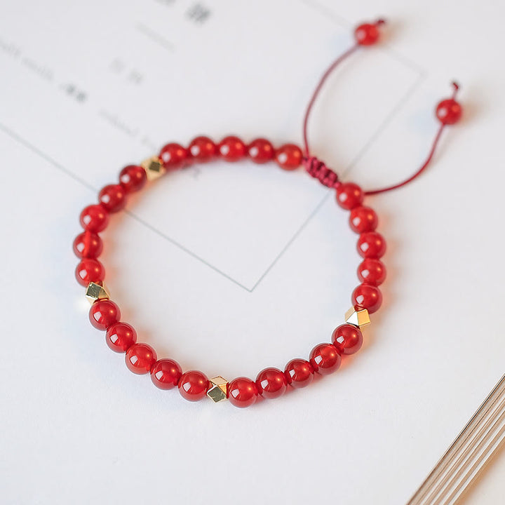 Bracelet de confiance en forme d'étoile à quatre feuilles en agate rouge naturelle avec nœud sans fin
