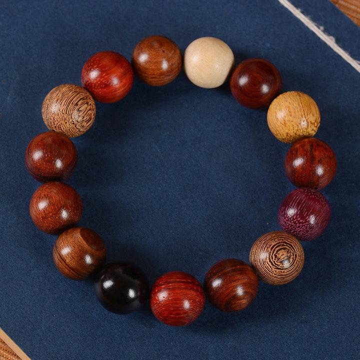 Bracelet de guérison et de protection en bois de santal multicolore Buddha Stones