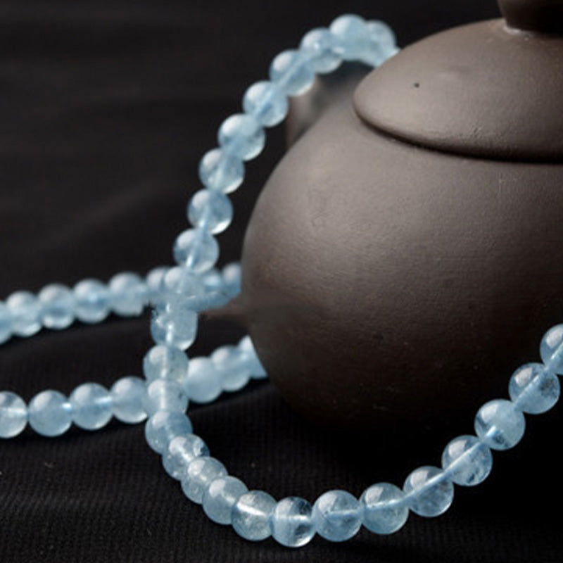 Bracelet de guérison de la paix en aigue-marine naturelle de Buddha Stones