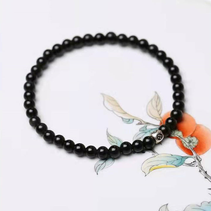 Bracelet de force de purification en obsidienne noire naturelle et quartz fumé de Buddha Stones