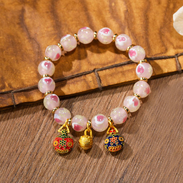 Bracelet de bénédictions en perles de verre Liuli fluorescentes en forme de cœur d'amour rose lumineux avec breloque en forme de famille de bêtes avaleuses en or et Buddha Stones