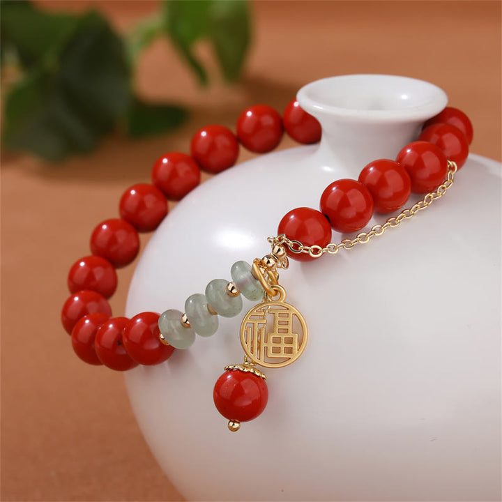 Bracelet de jade apaisant de caractère Fu de bon augure avec Buddha Stones en cinabre