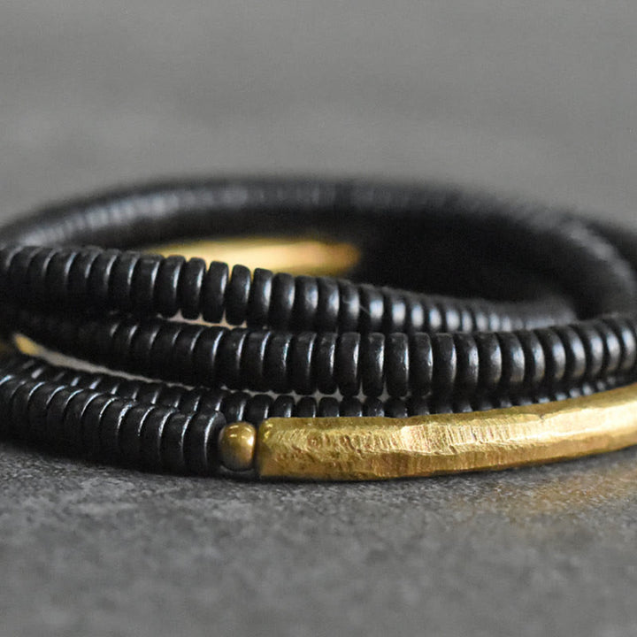 Bracelet multicouches en bois d'ébène et cuivre avec Buddha Stones