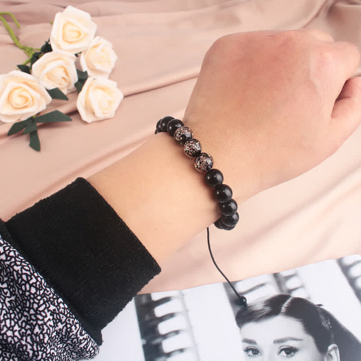 Bracelet de force lumineux en obsidienne noire Buddha Stones