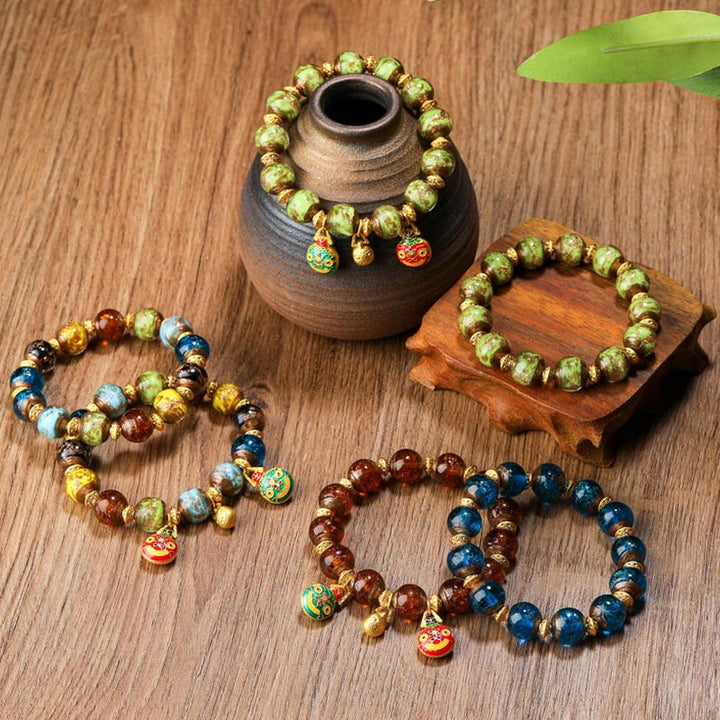 Bracelet porte-bonheur en perles de verre Liuli avec breloque de la famille des bêtes avaleuses en or et Buddha Stones