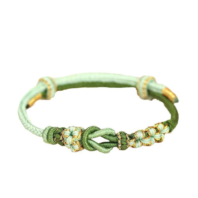 Bracelet de protection porte-bonheur fait main en Buddha Stones avec nœud en fleur de pêcher à huit fils