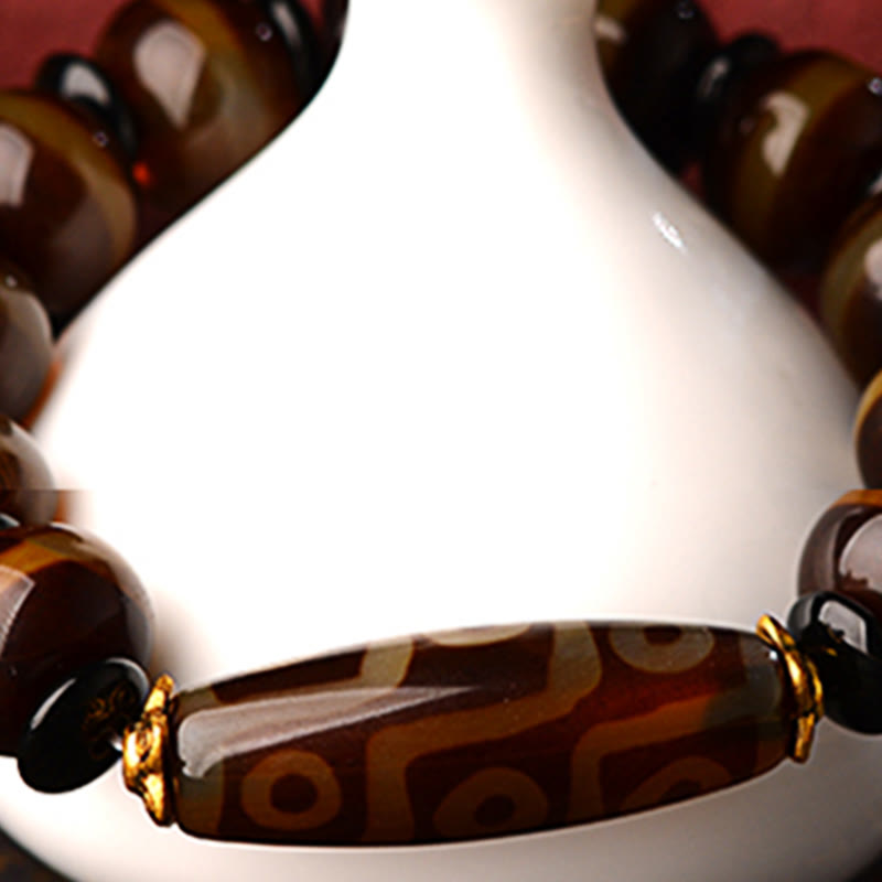 Bracelet tibétain en agate naturelle à neuf yeux avec perles dzi et Buddha Stones