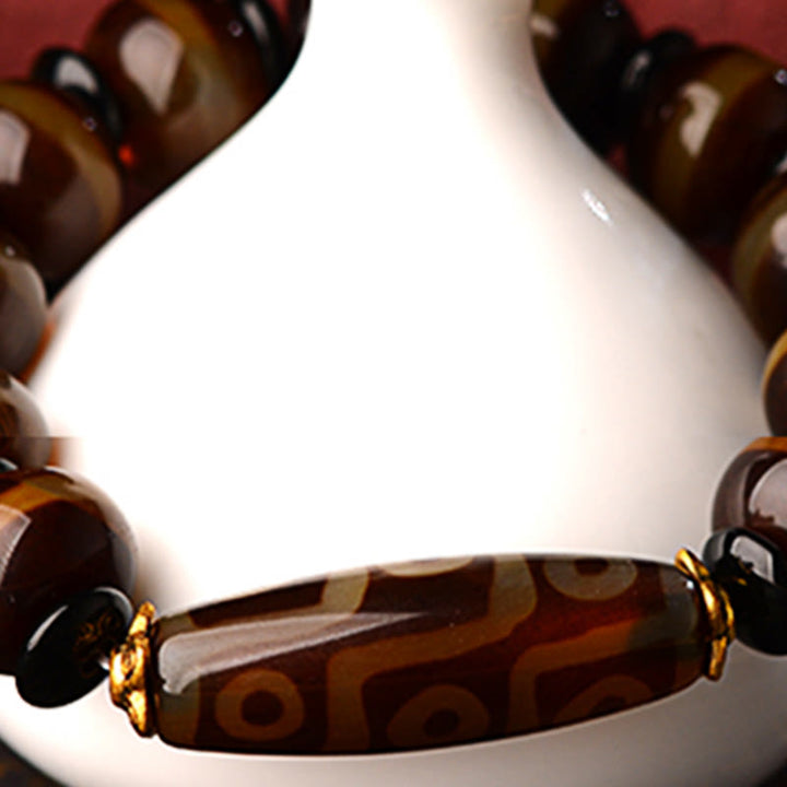 Bracelet tibétain en agate naturelle à neuf yeux avec perles dzi et Buddha Stones