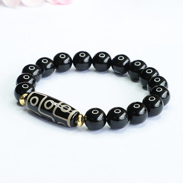 Bracelet de puissance tibétain en onyx noir avec perles dzi à neuf yeux et Buddha Stones