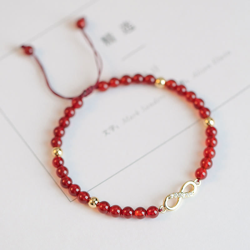 Bracelet de confiance en forme d'étoile à quatre feuilles en agate rouge naturelle avec nœud sans fin