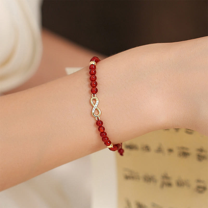 Bracelet de confiance en forme d'étoile à quatre feuilles en agate rouge naturelle avec nœud sans fin