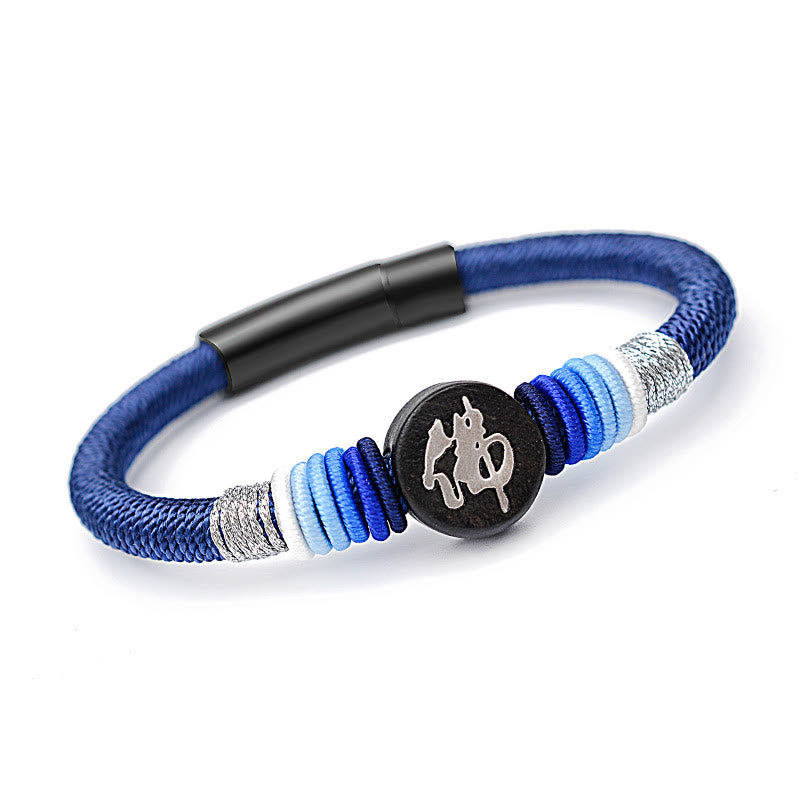 Bracelet en corde fait main en ébène avec personnage de Bouddha de Buddha Stones