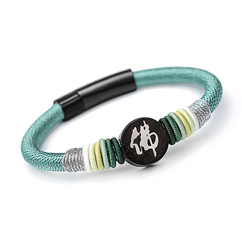 Bracelet en corde fait main en ébène avec personnage de Bouddha de Buddha Stones