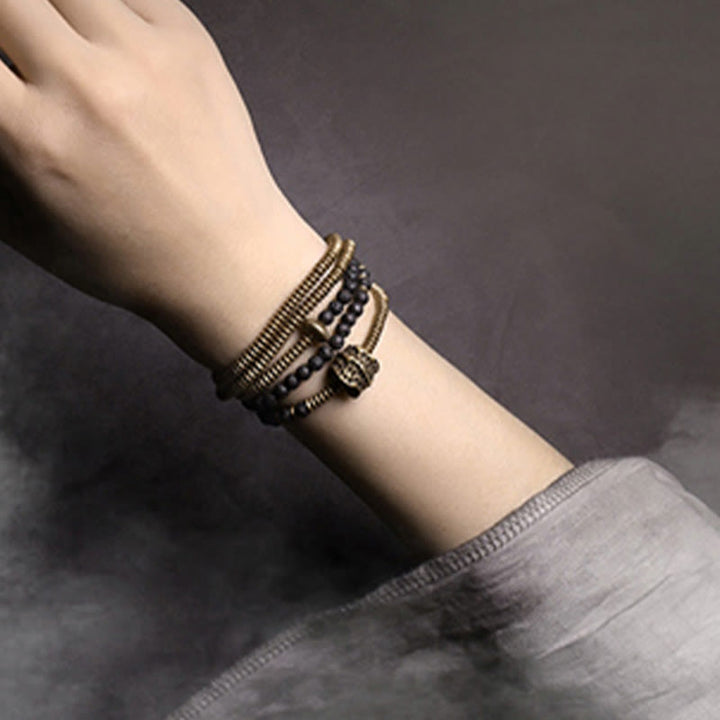 Bracelet multicouche de guérison en cuivre et pierres de lave vintage de Buddha Stones