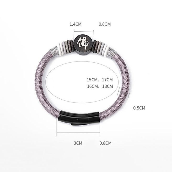 Bracelet en corde fait main en ébène avec personnage de Bouddha de Buddha Stones