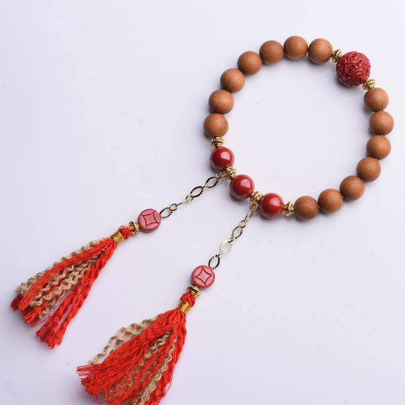 Bracelet Buddha Stones en bois de pêche et cinabre naturel avec pompons de richesse PiXiu