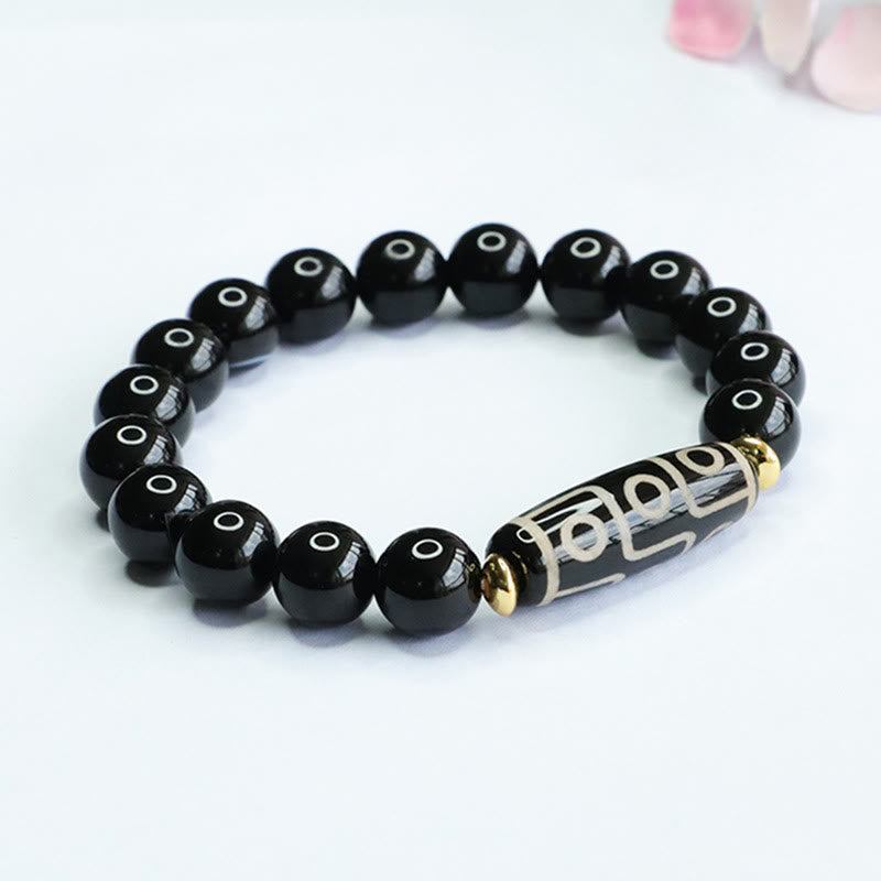 Bracelet de puissance tibétain en onyx noir avec perles dzi à neuf yeux et Buddha Stones
