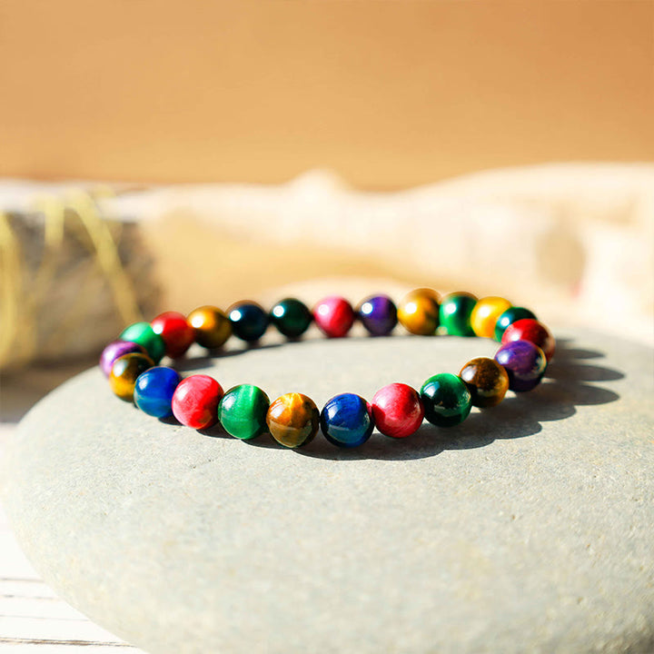 Bracelet courageux et résolu en œil de tigre avec Buddha Stones