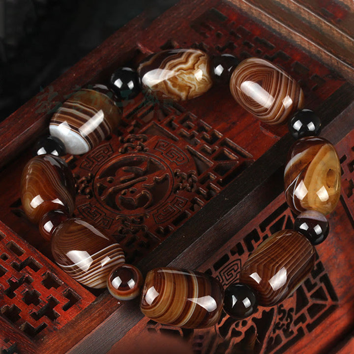 Bracelet de courage et de bonheur en sardonyx naturel Buddha Stones