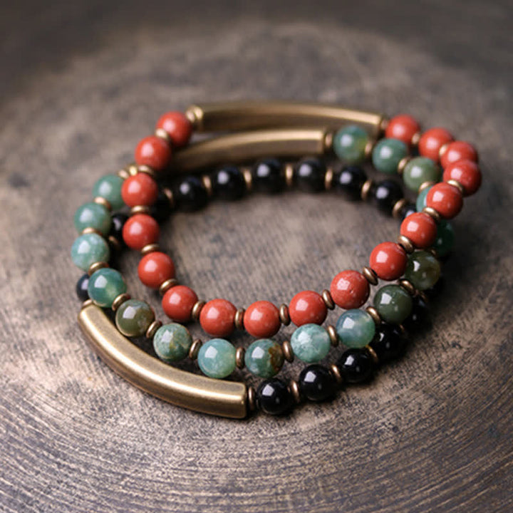 Bracelet couple paix en cuivre et cristal d'obsidienne noire en Buddha Stones Jaspe rouge Agate mousse