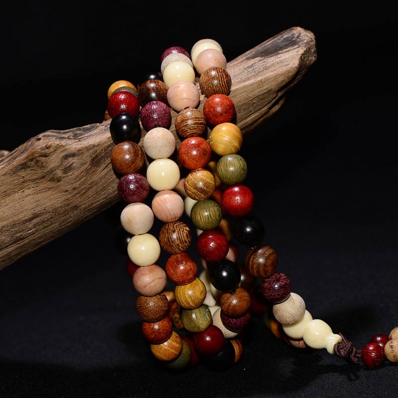 Bracelet de méditation et de bénédiction Mala en bois de wengé avec 108 perles de Buddha Stones