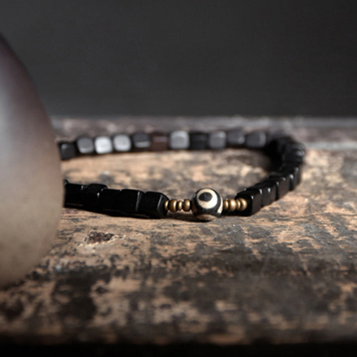 Bracelet couple paix en cuivre avec perles dzi en bois d'ébène