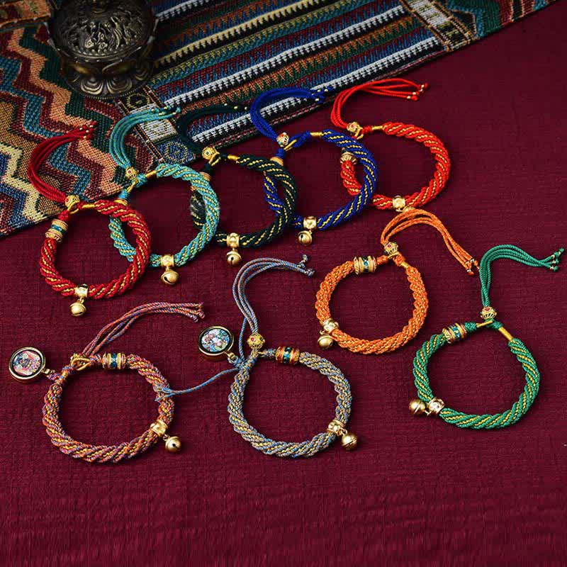 Bracelet tibétain fait main avec breloque en corde tressée et roue de prière Thangka pour protection de la chance