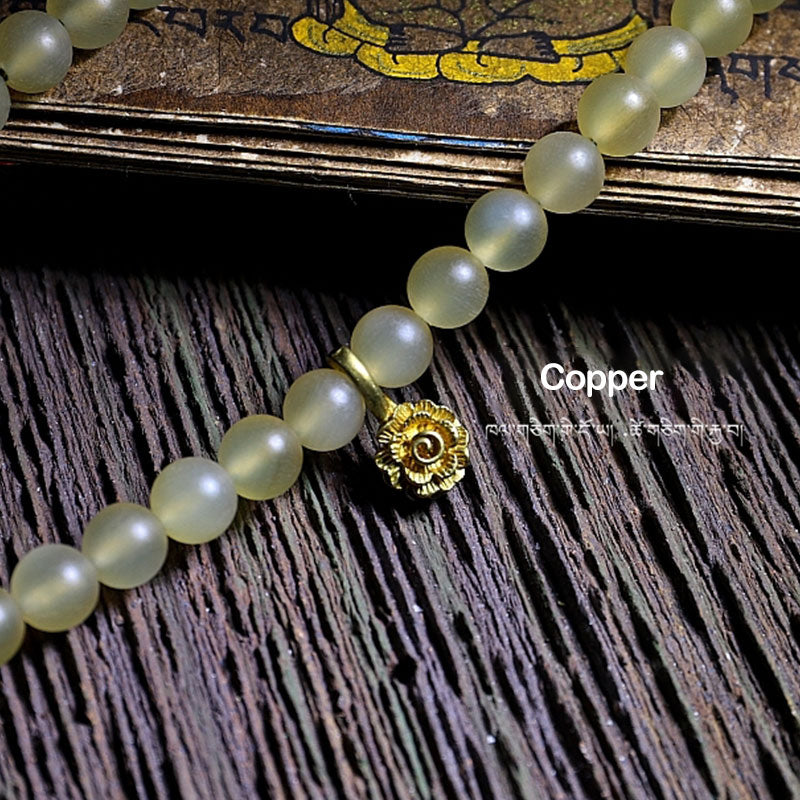 Bracelet porte-bonheur en ambre avec 108 Buddha Stones de Mala en corne de mouton du Tibet