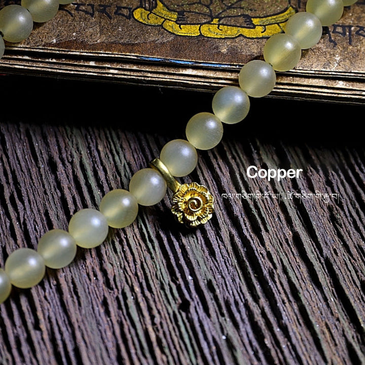 Bracelet porte-bonheur en ambre avec 108 Buddha Stones de Mala en corne de mouton du Tibet