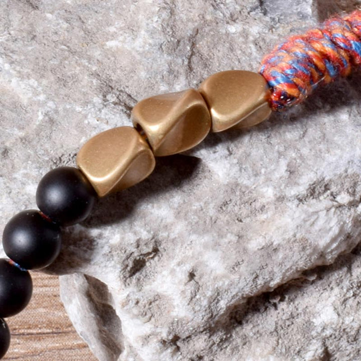 Bracelet à pampilles en onyx noir tibétain fait main avec Buddha Stones