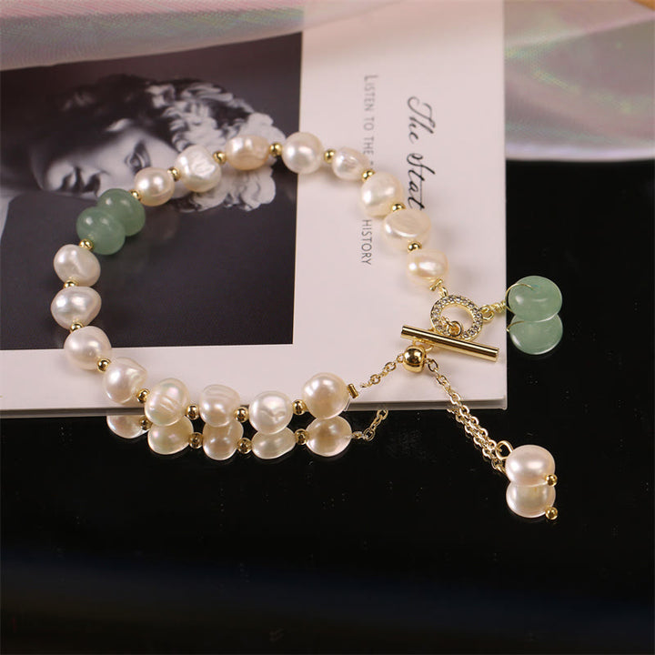 Bracelet de guérison en perles de quartz vert fraise avec Buddha Stones