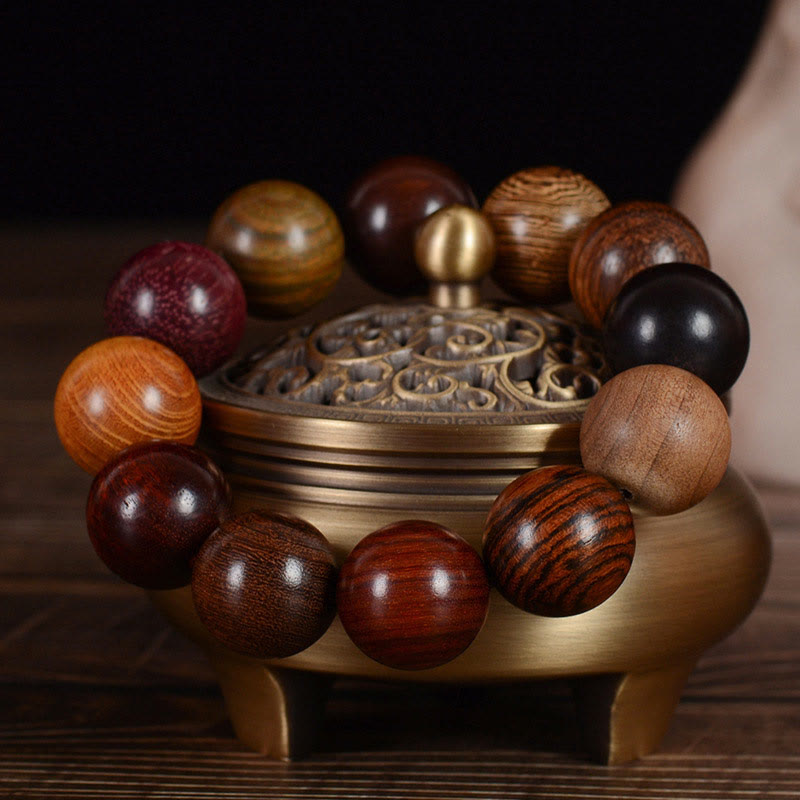 Bracelet de guérison et de protection en bois de santal multicolore Buddha Stones