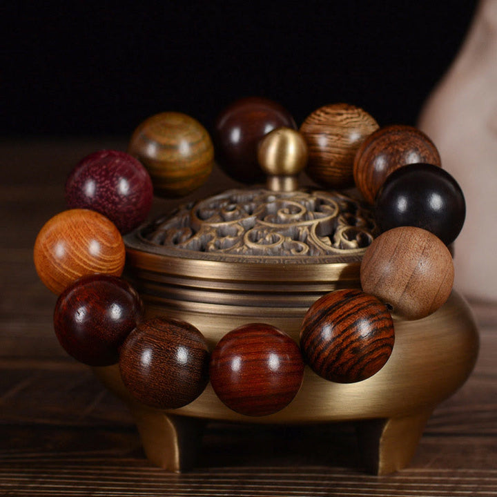 Bracelet de guérison et de protection en bois de santal multicolore Buddha Stones