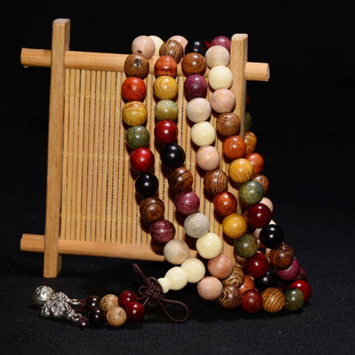 Bracelet de méditation et de bénédiction Mala en bois de wengé avec 108 perles de Buddha Stones