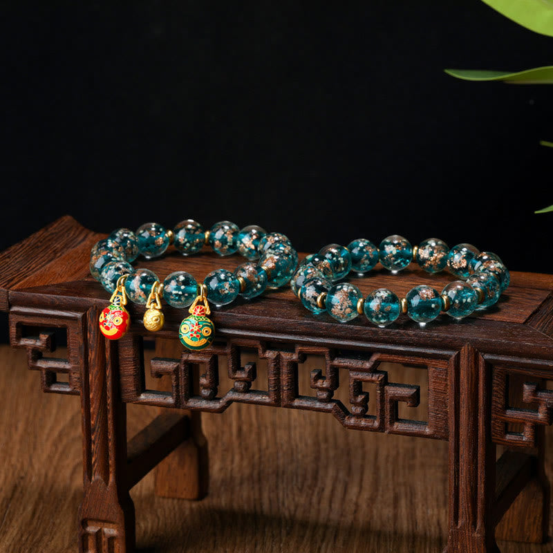 Bracelet de réussite en perles de verre Liuli fluorescentes lumineuses avec breloque de famille de bêtes avaleuses en or et Buddha Stones