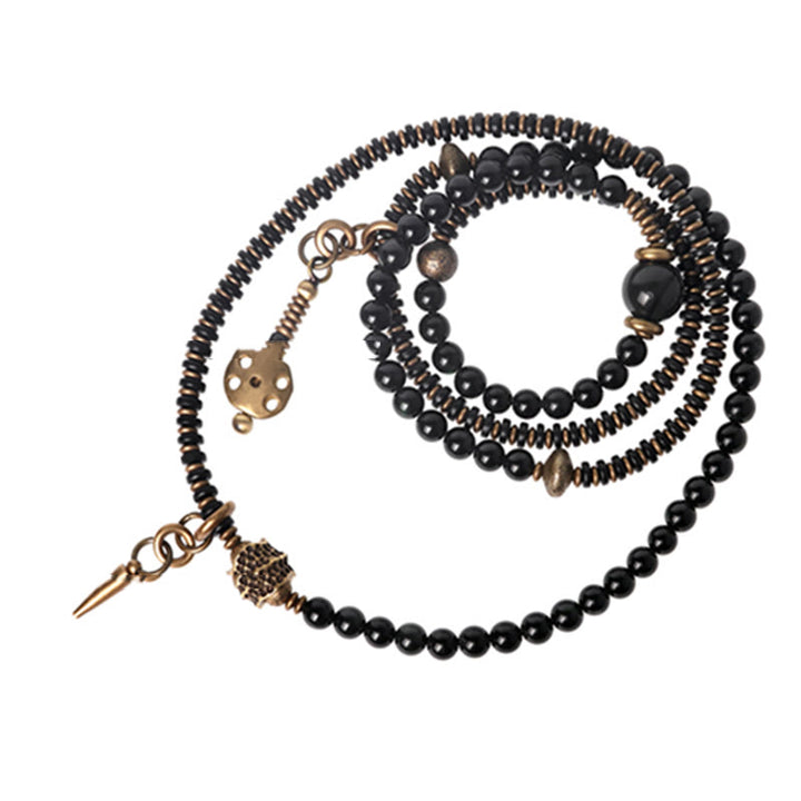 Bracelet multicouche positif en cuivre et bois d'ébène avec Buddha Stones arc-en-ciel obsidienne