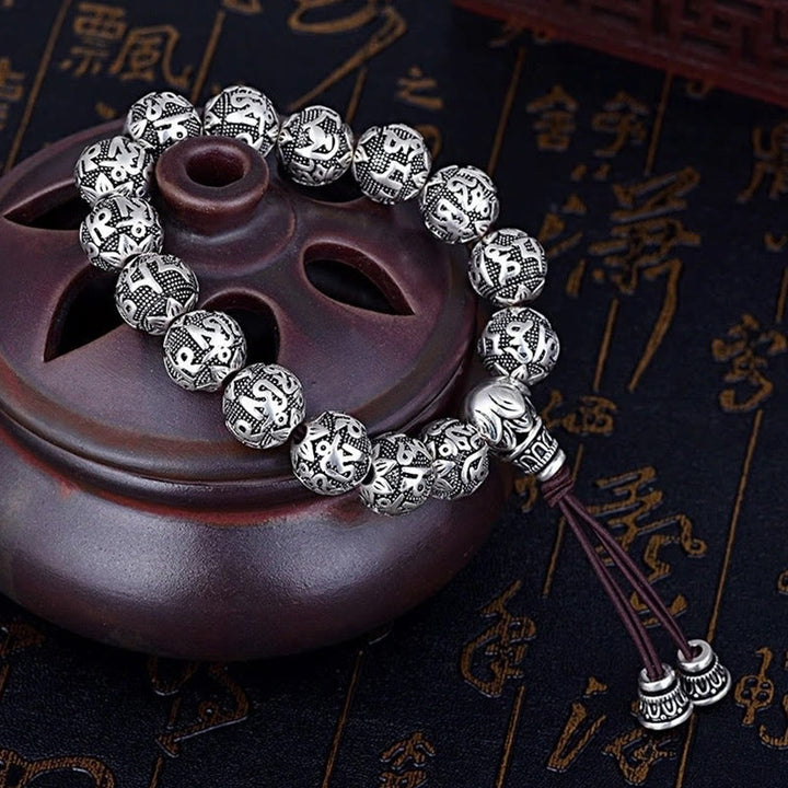 Bracelet amulette en perles en alliage sculptées avec Buddha Stones tibétaines Om Mani Padme Hum