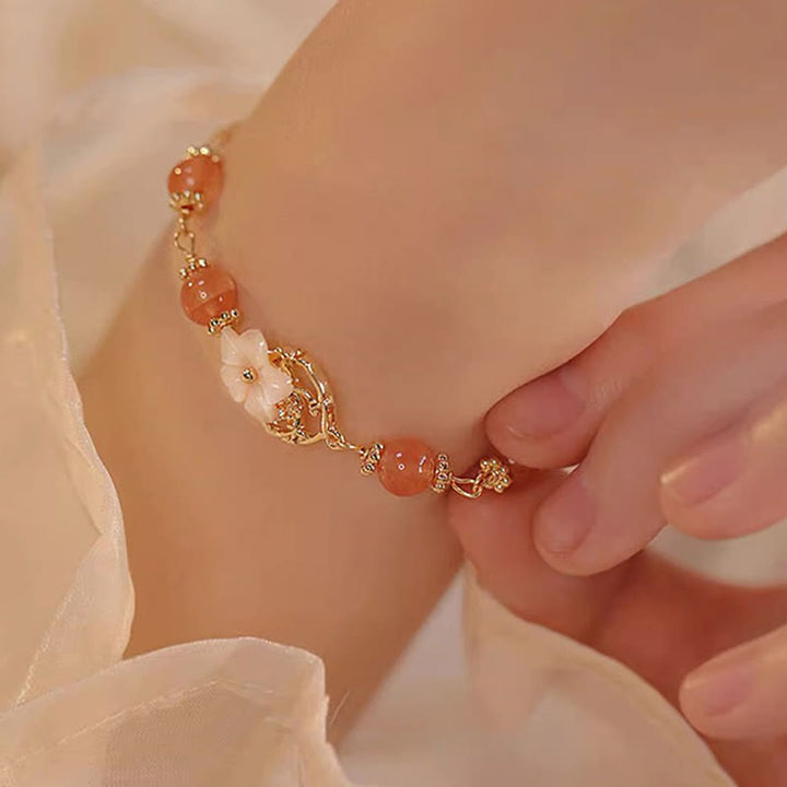 Bracelet de confiance en forme de fleur en pierre d'agate rouge Tridacna de Buddha Stones